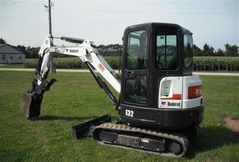 new bobcat mini excavator price|bobcat mini excavator cost.